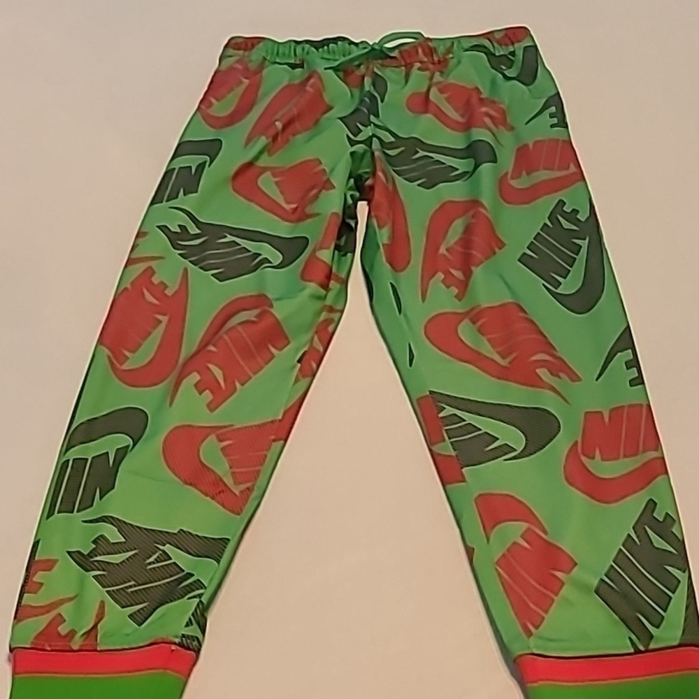 - Nike Swoosh 2017 pair of work out pants size Medium. measures W. 32"x L.…